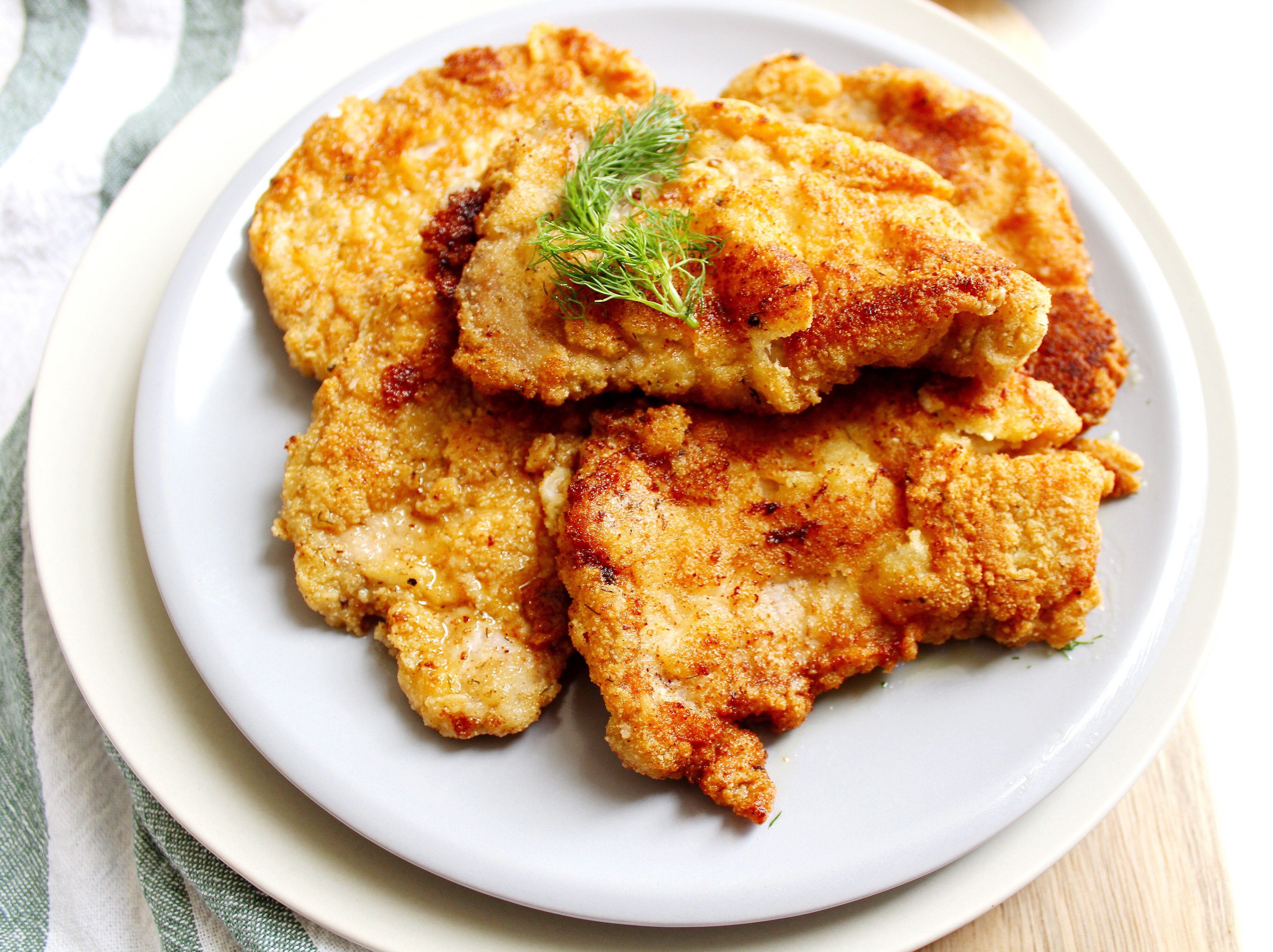 Polish Pork Cutlets Crispy Pork Cutlets with Fresh Dill on top