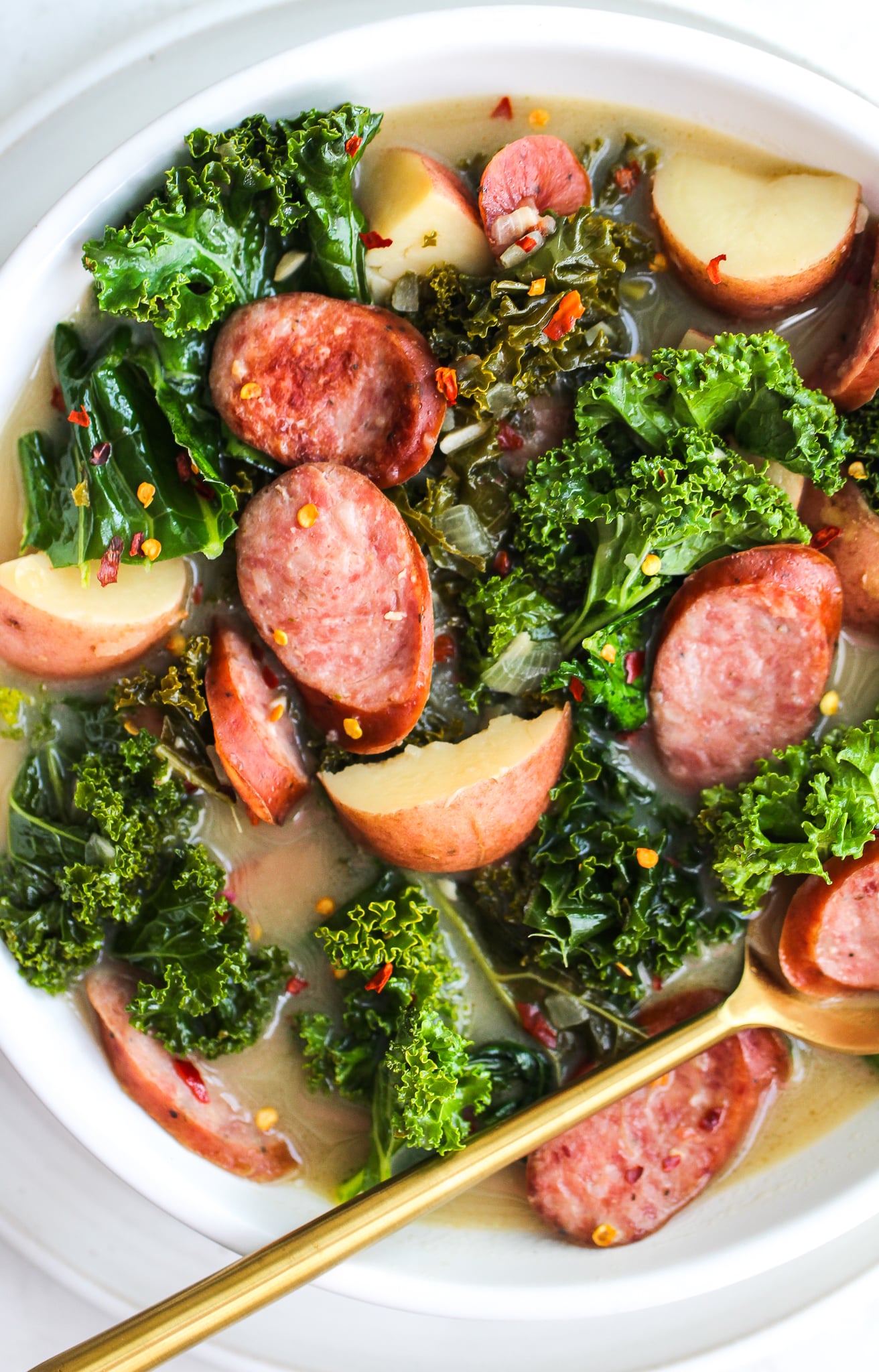 Bowl of sausage, kale & potato soup