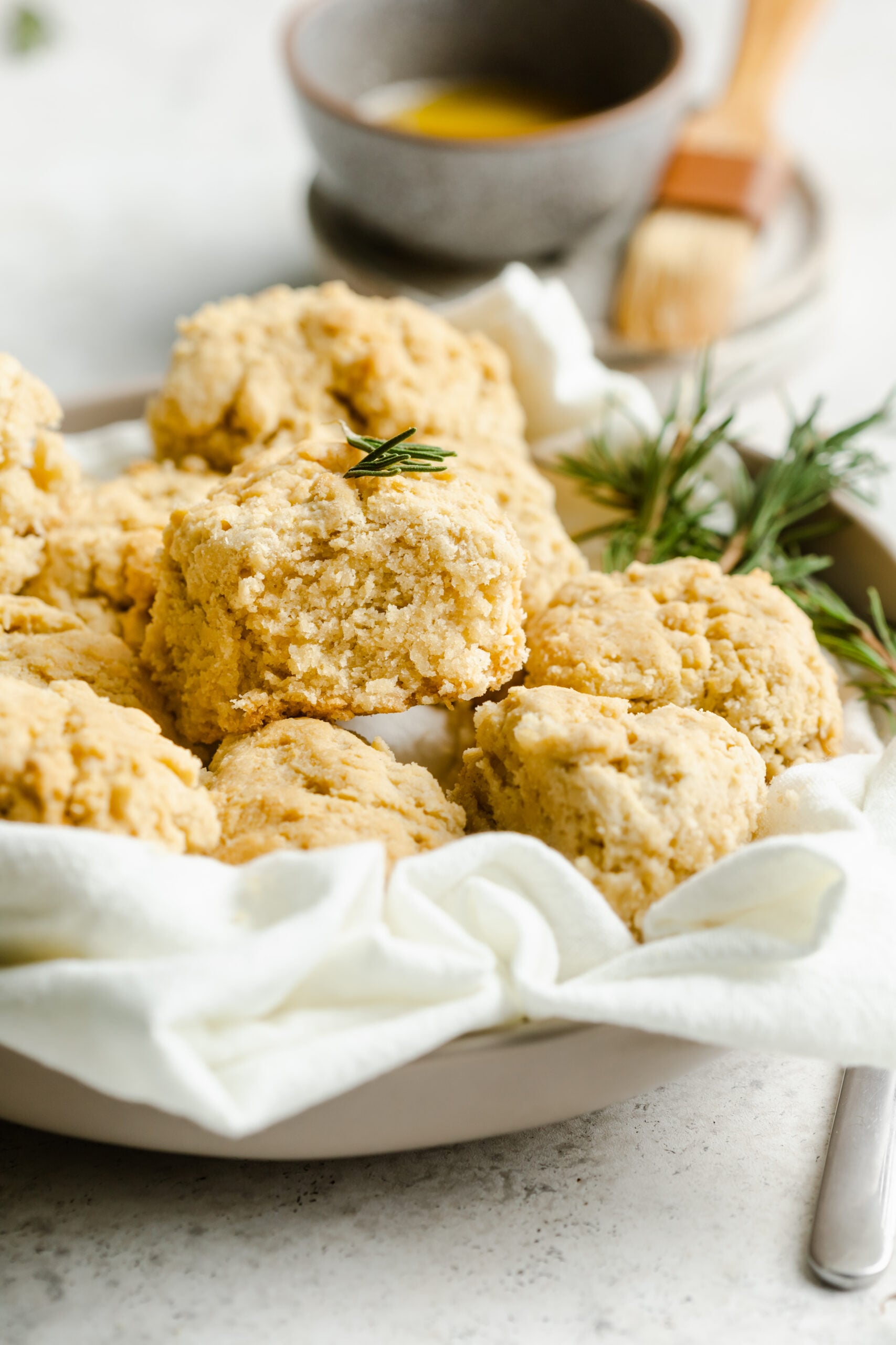 Fluffy gluten free drop biscuits in a serving basket