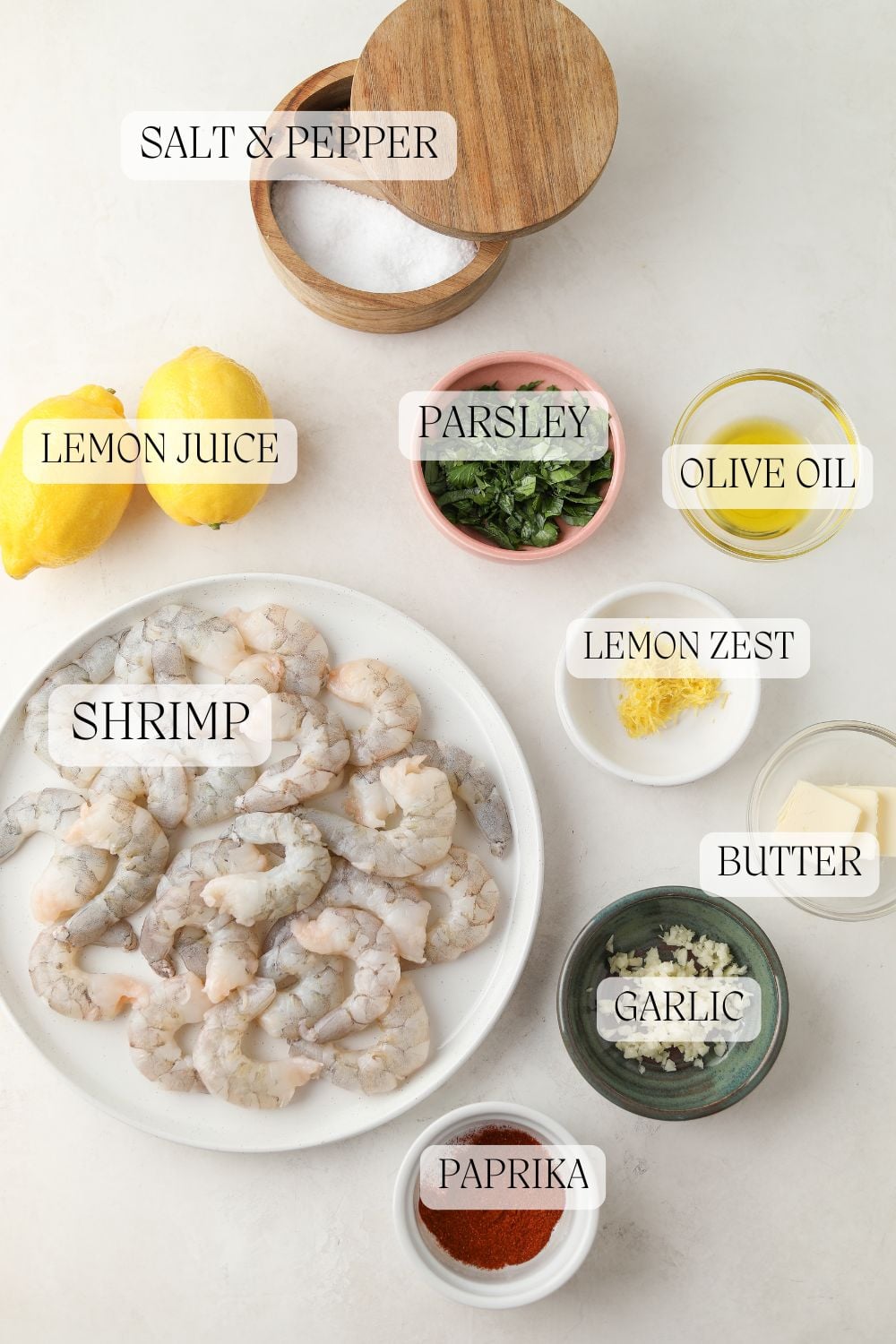 overhead photo of ingredients used in this lemon garlic shrimp recipe - each ingredient is labeled